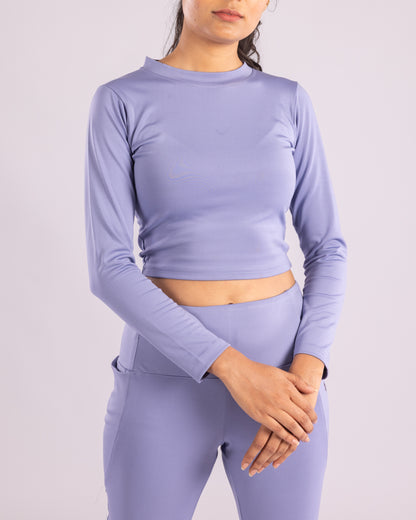 Seamless Powder Blue full sleeve crop top for women’s gym wear, designed with breathable, sweat-wicking, and ultra-stretch Lycra fabric. Body-hugging fit for training, running, yoga, and active lifestyle. Lightweight, flexible, and stylish workout top