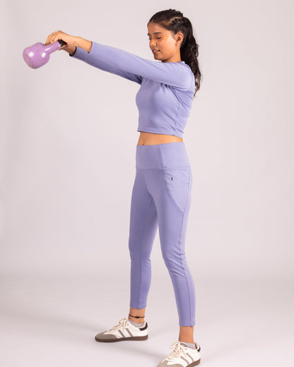 Powder Blue seamless co-ord set for women, featuring high-waisted tummy-control jeggings and a full sleeve crop top. Stretchable, breathable, non-sheer gym activewear set designed for yoga, pilates, running, training, and everyday athleisure. Sweat-wicking, sculpting fit for maximum comfort and style