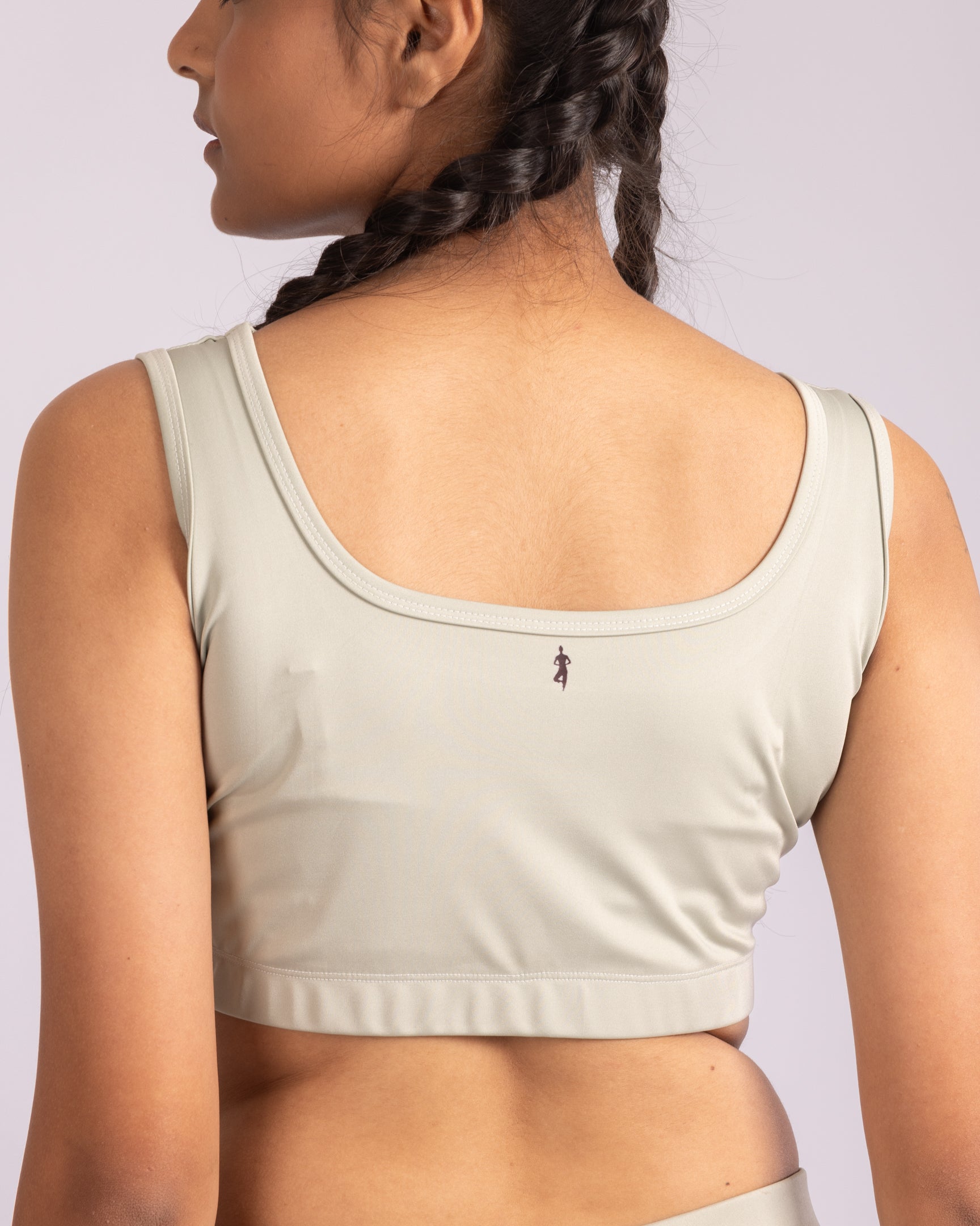 Sculpting sage green sleeveless crop top, form-fitting with a flexible, stretchable design, ideal for gym, fitness, training, and everyday athleisure.