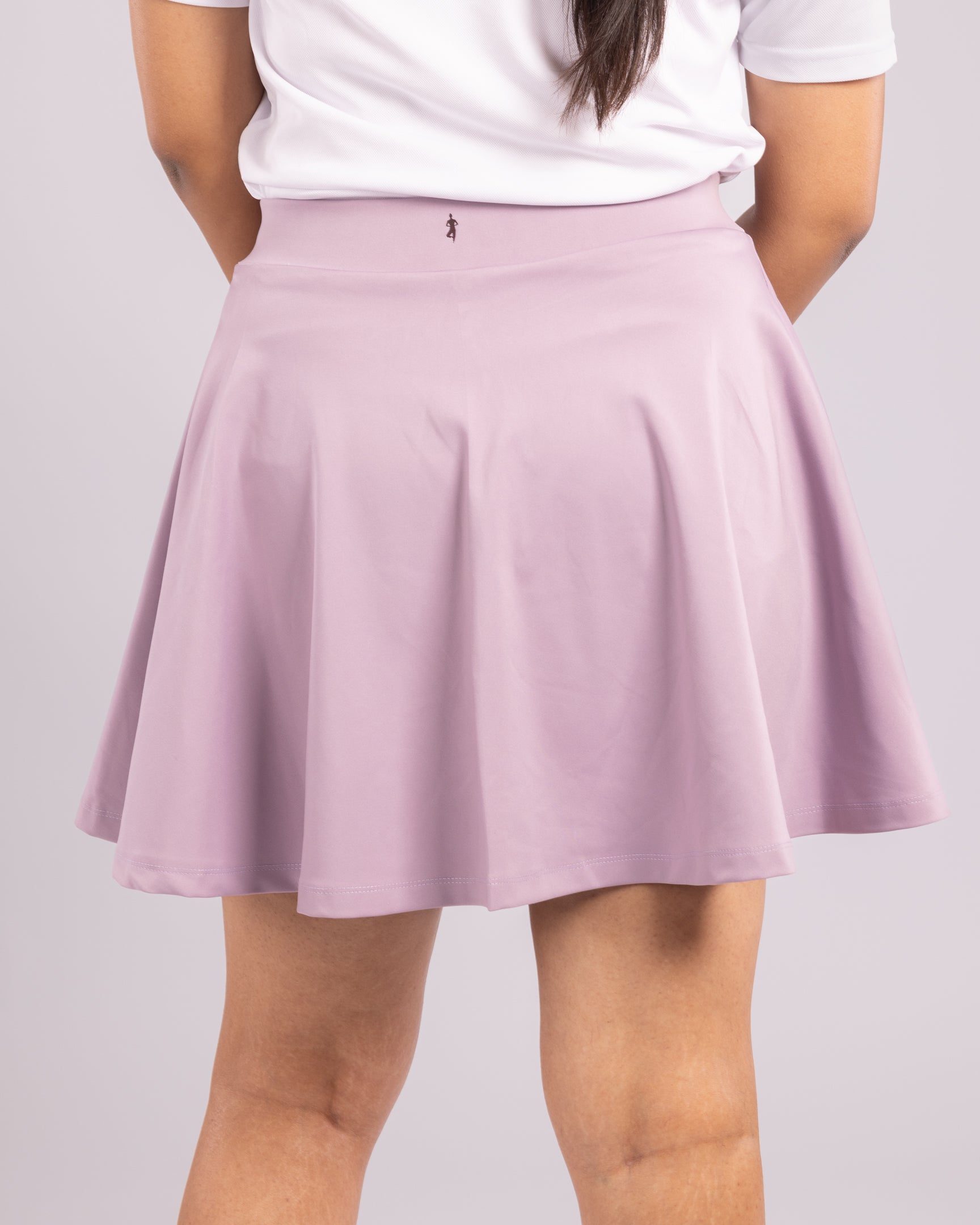  Flattering high-waisted lavender athletic skort with a flowy, A-line silhouette, designed for a stylish, functional look while providing maximum coverage, support, and comfort for gym, sports, running, and everyday movement.