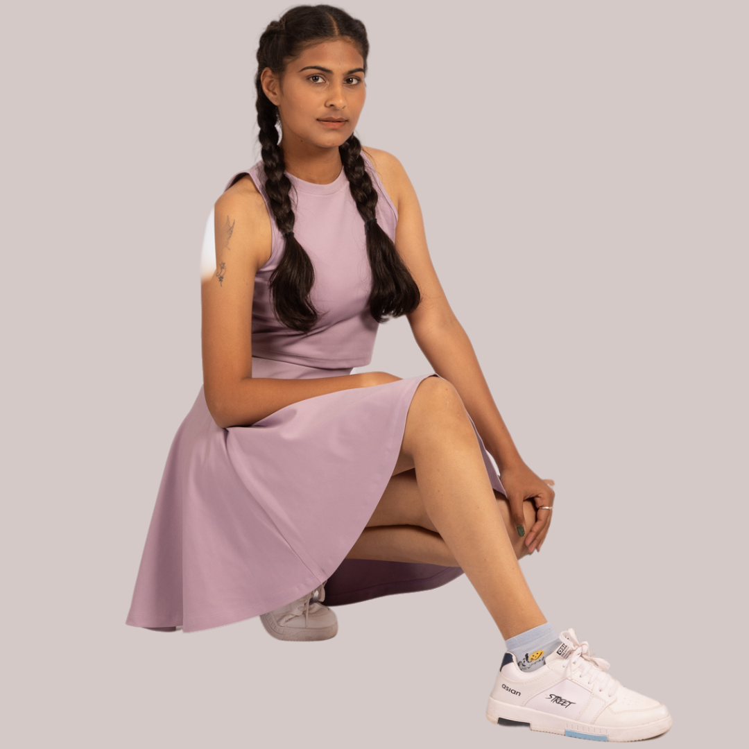 Veronica 2-in-1 high-waisted athletic tennis skort and seamless gym crop top set in lavender, crafted from premium stretchable, moisture-wicking Lycra for superior comfort, flexibility, and breathability during workouts, tennis matches, yoga, gym sessions, and casual sporty outfits.